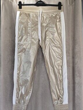 ⭐️Under Armour Women’s Shiny Gokd Track Pants with White Side Panels⭐️